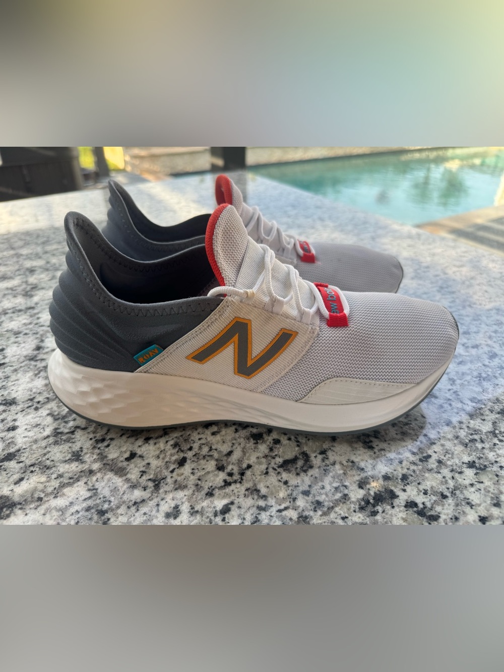 New Balance Men’s White Mesh Sneakers with Yellow N and Red Accents